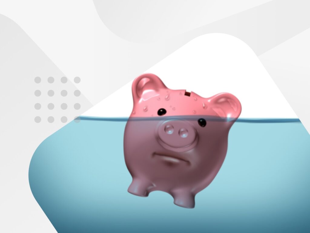 Piggy bank floating in water